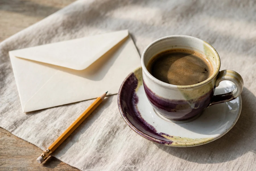 Notes and tray controls: coffee still life